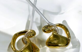 Gold plated earmoulds for hearing aid allergy solution